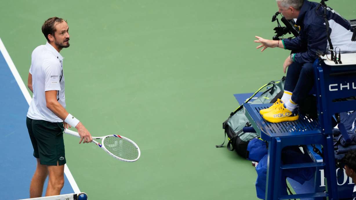 Daniil Medvedev, of Russia, left, talks with the official during the second round of the U.S. Open tennis championships against Sebastian Gorzny, of the United States, Wednesday, Sept. 2, 2026, in New York.
