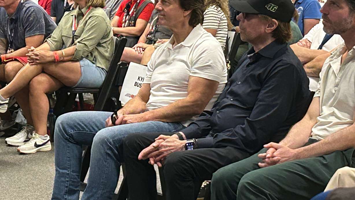 Actor Tom Cruise and movie producer Jerry Bruckheimer attend a drivers meeting before a NASCAR Cup Series auto race at Daytona International Speedway, Saturday, Aug. 29, 2026, in Daytona Beach, Fla.
