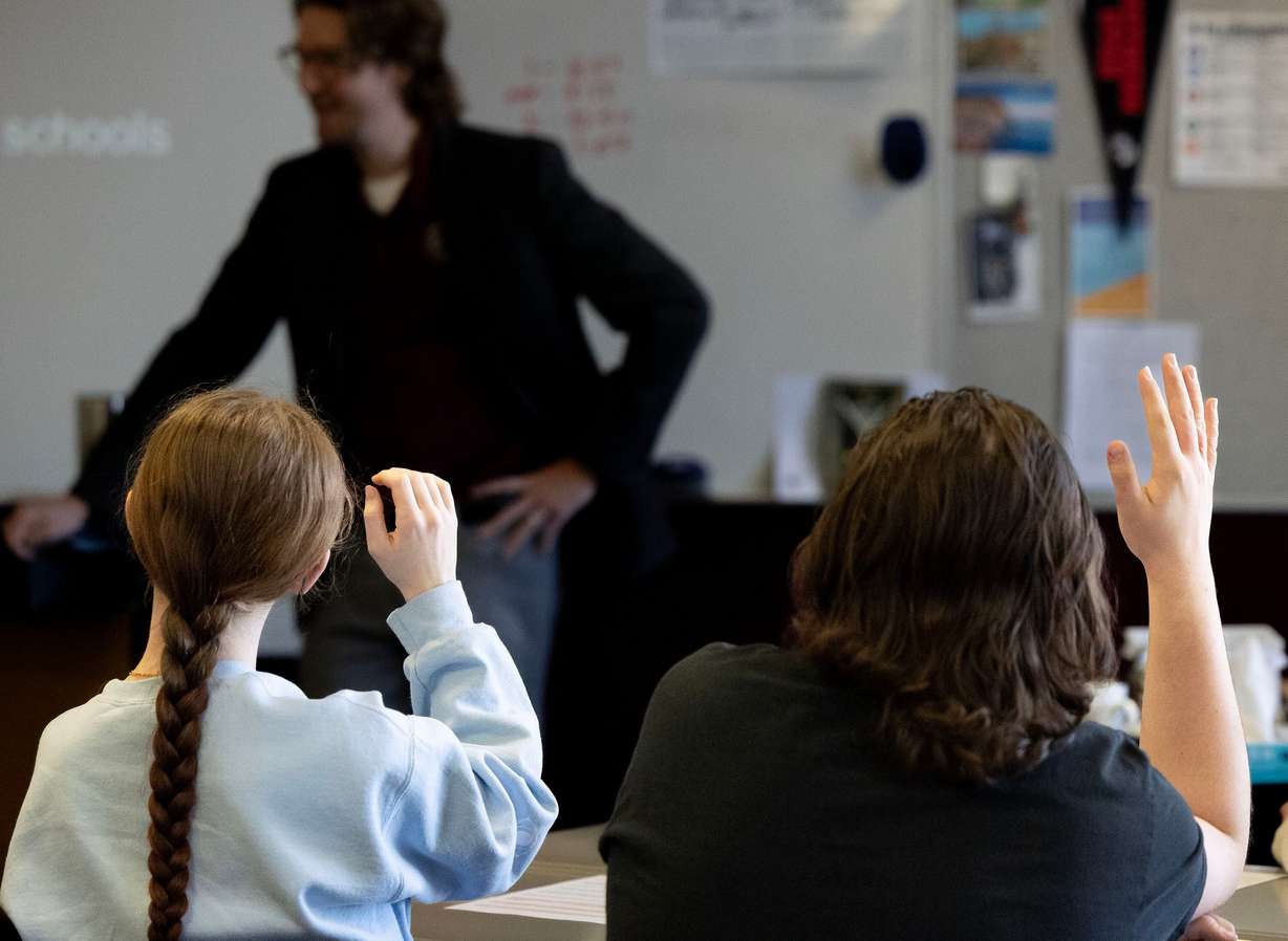 Students raise their hand during class at Jordan High School in Sandy on Thursday, Jan. 15. The Department of Education is warning schools to release educational records to parents or risk loss of federal funding.