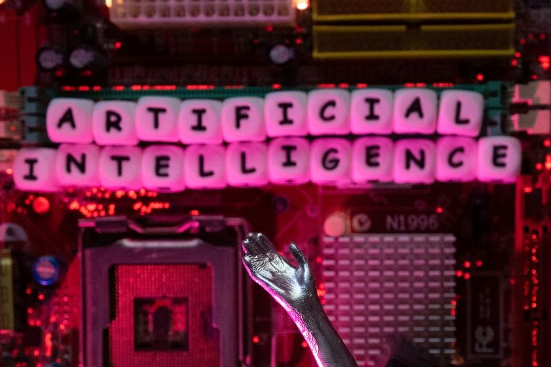 AI (Artificial Intelligence) letters and robot hand are placed on computer motherboard in this illustration taken, June 23, 2023.