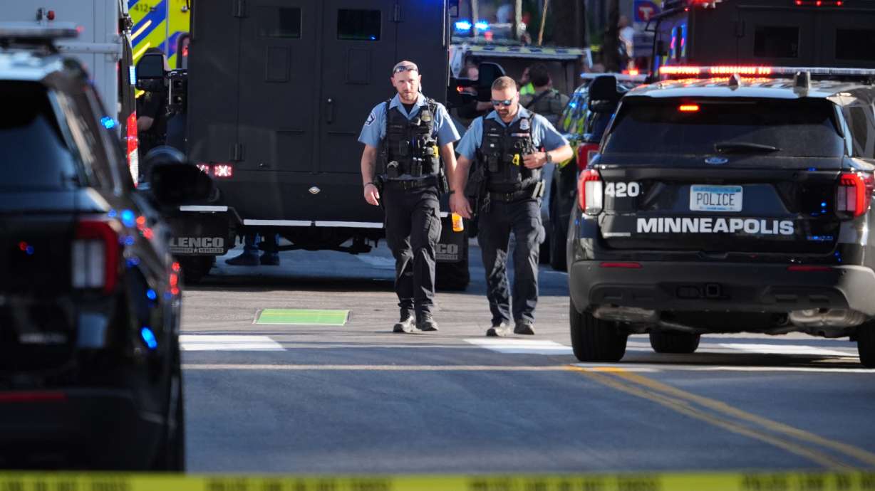 Police respond to a shooting Wednesday in downtown Minneapolis.