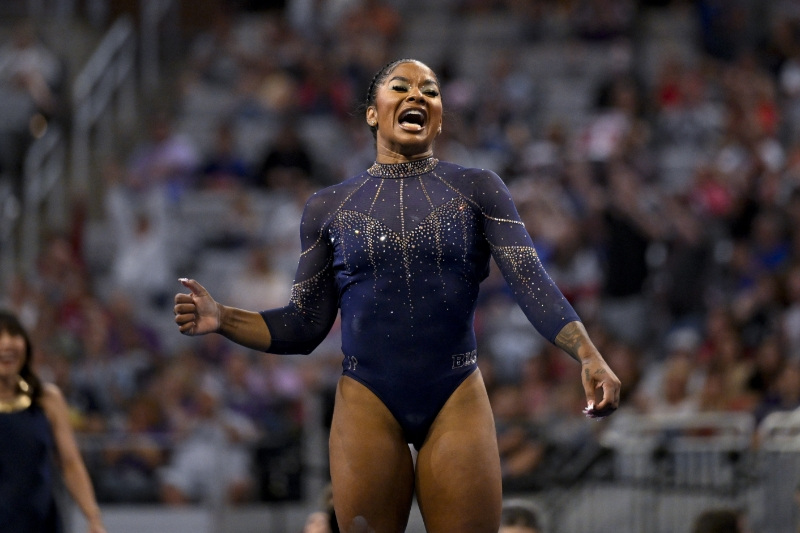 Apr 16, 2026; Fort Worth, TX, USA; UCLA gymnast Jordan Chiles performs on floor exercise during semifinals for the 2026 NCAA Women’s Gymnastics National Championships at Dickies Arena.