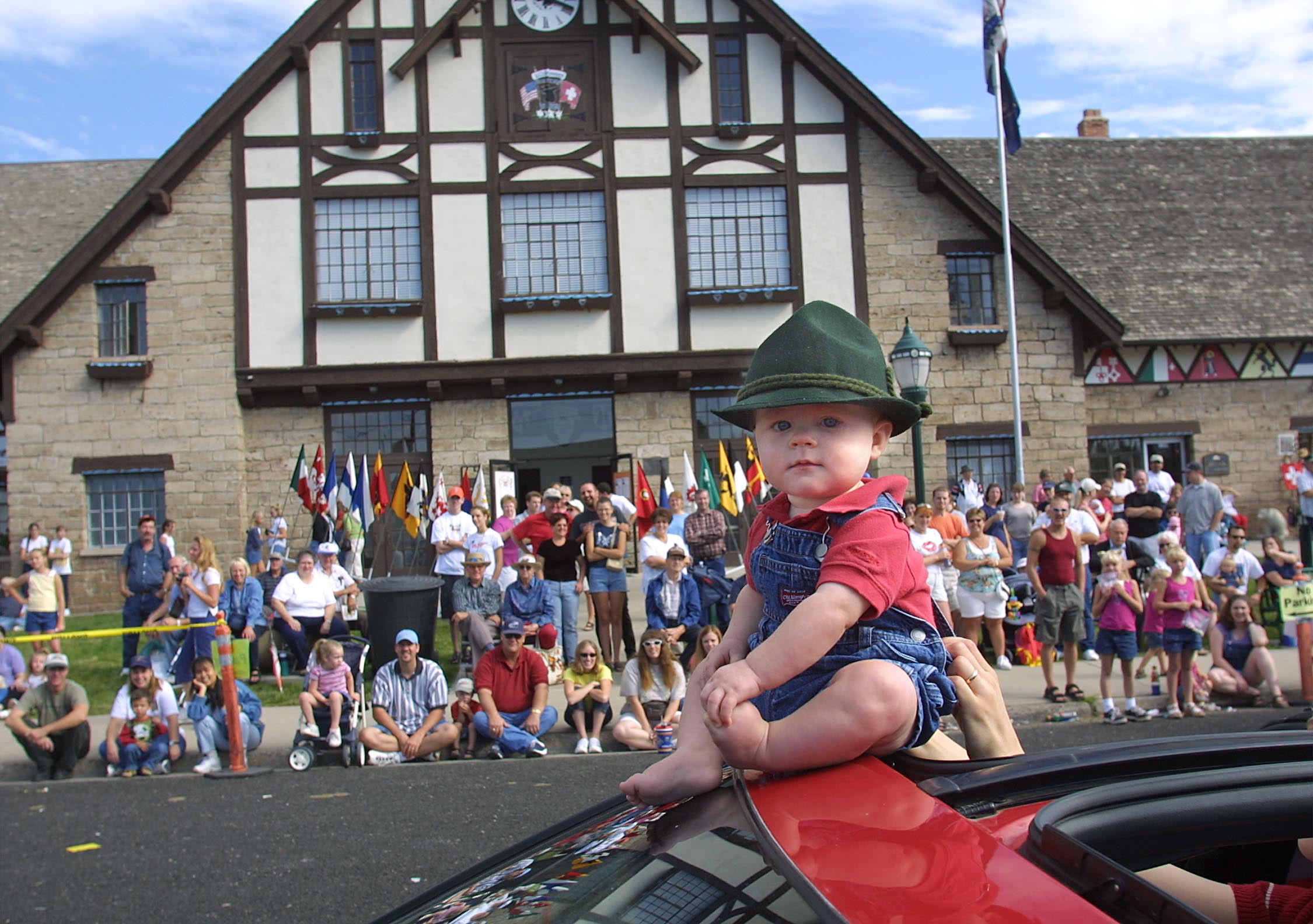 Matthew Larsen sits outside of his sky roof as he rides in the Swiss Days parade float in Midway on Sept. 1, 2001.
