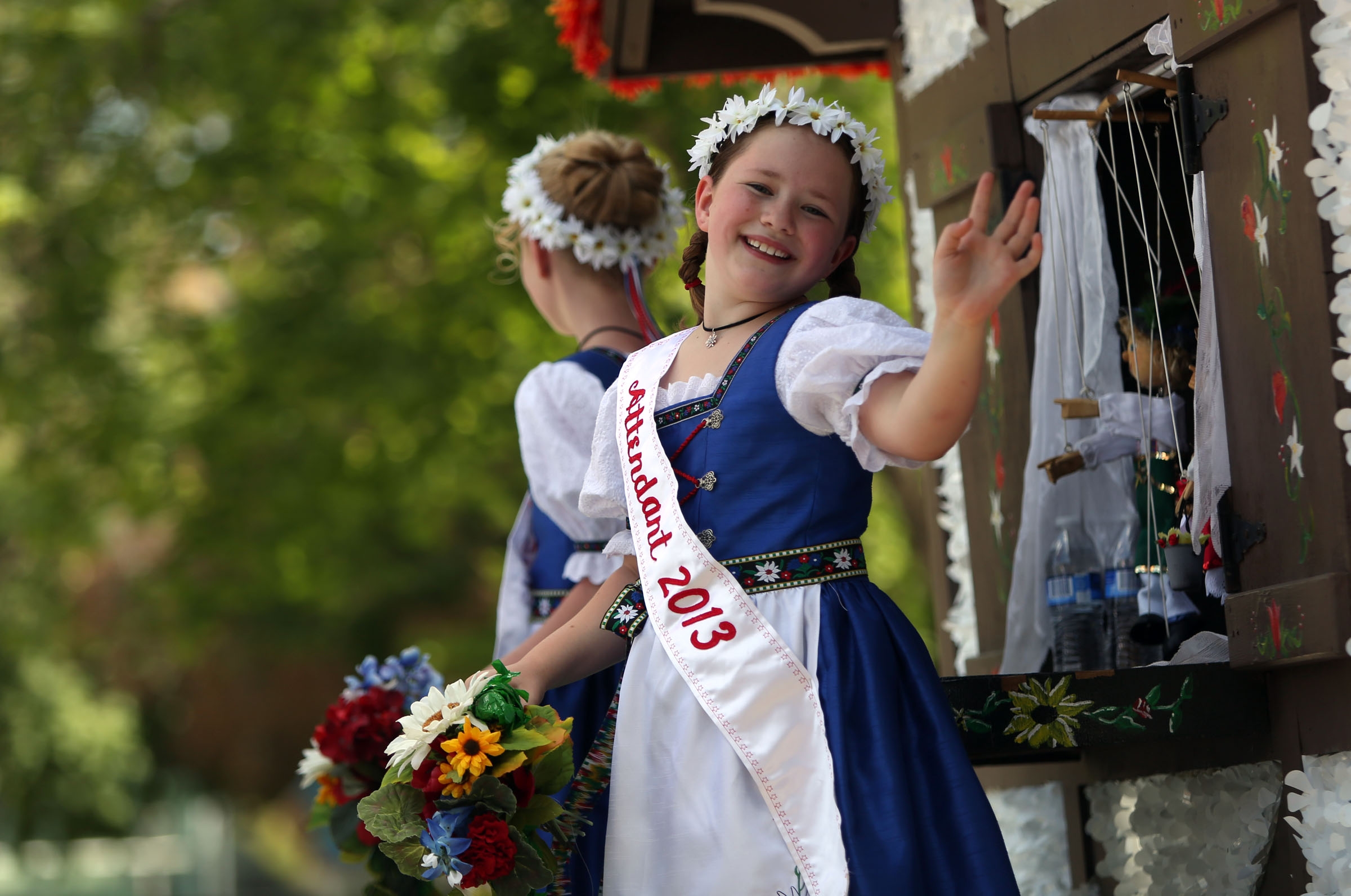 Swiss Miss royalty ride the Swiss Miss float in the Days of '47 Youth Parade in Salt Lake City on July 20, 2013.