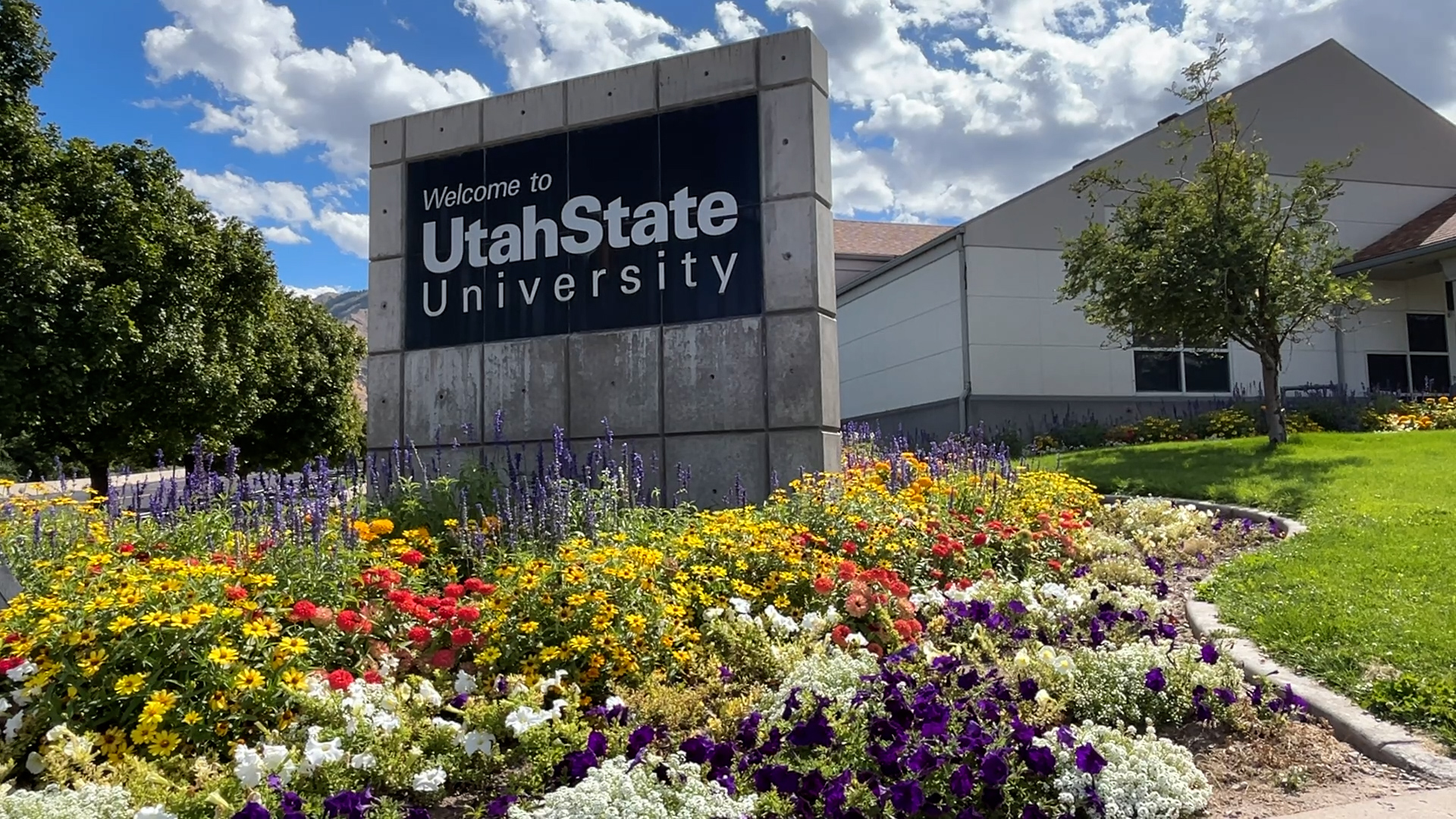 A sign for Utah State University is pictured.