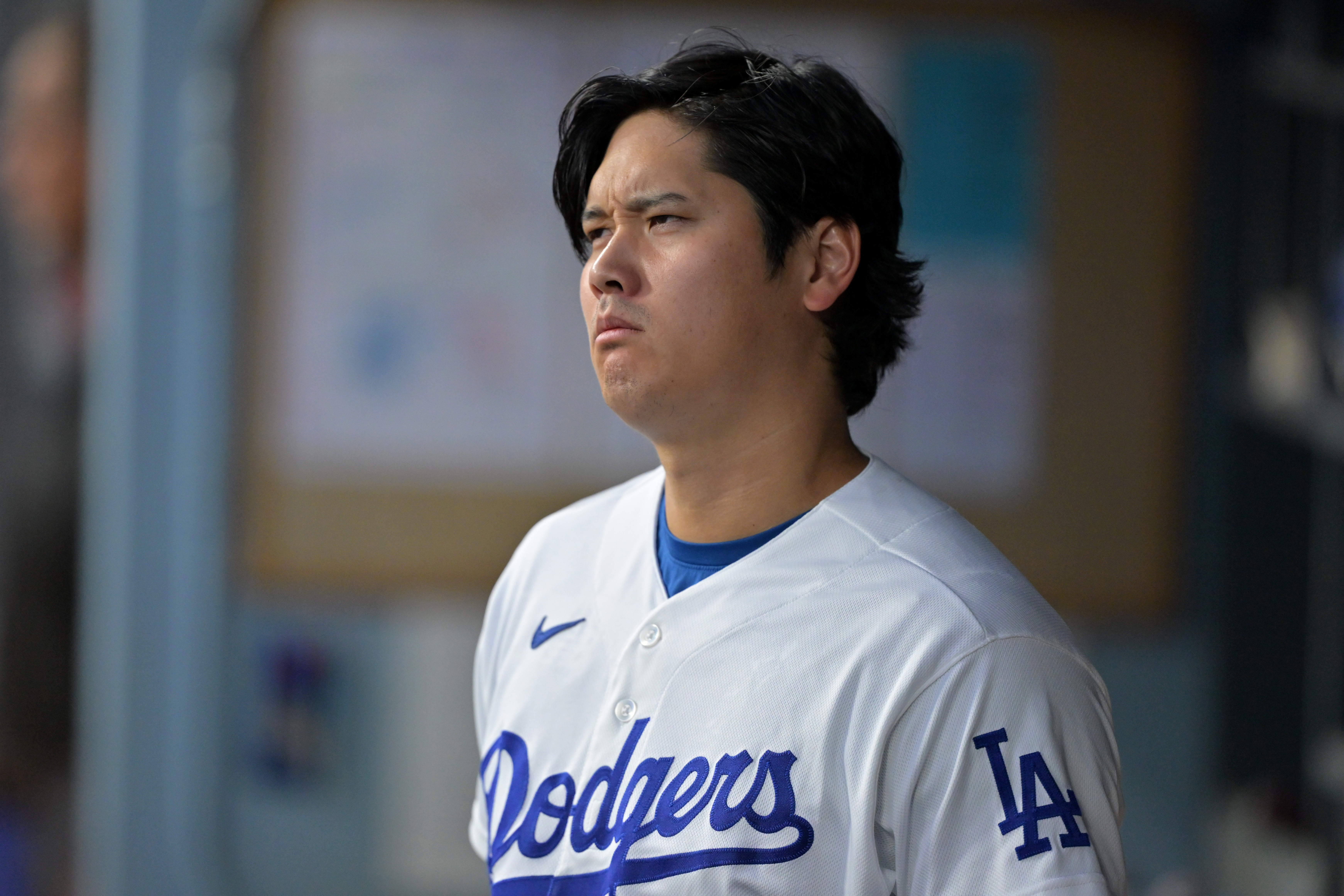 Los Angeles Dodgers' Shohei Ohtani looks on from the dugout during the first inning of a baseball game against the St. Louis Cardinals, Tuesday, Sept. 1, 2026, in Los Angeles. 