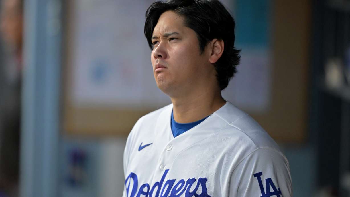Los Angeles Dodgers' Shohei Ohtani looks on from the dugout during the first inning of a baseball game against the St. Louis Cardinals, Tuesday, Sept. 1, 2026, in Los Angeles.