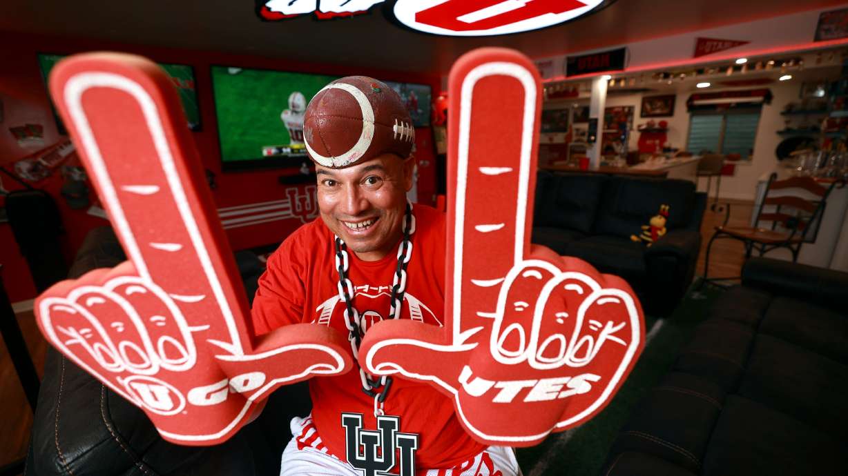 University of Utah football superfan Albert Gamboa poses for a portrait in the Utes-themed basement of his house in Riverton on Aug. 24.