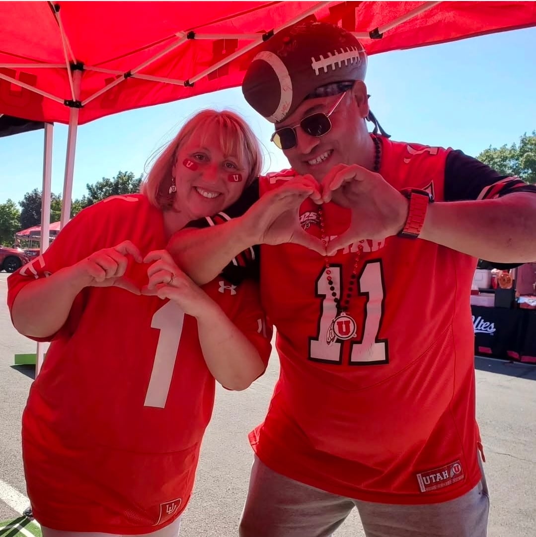 Marianna and Albert Gamboa enjoy tailgating prior to a University of Utah football game. The Gamboas are familiar faces in the Ute Nation.
