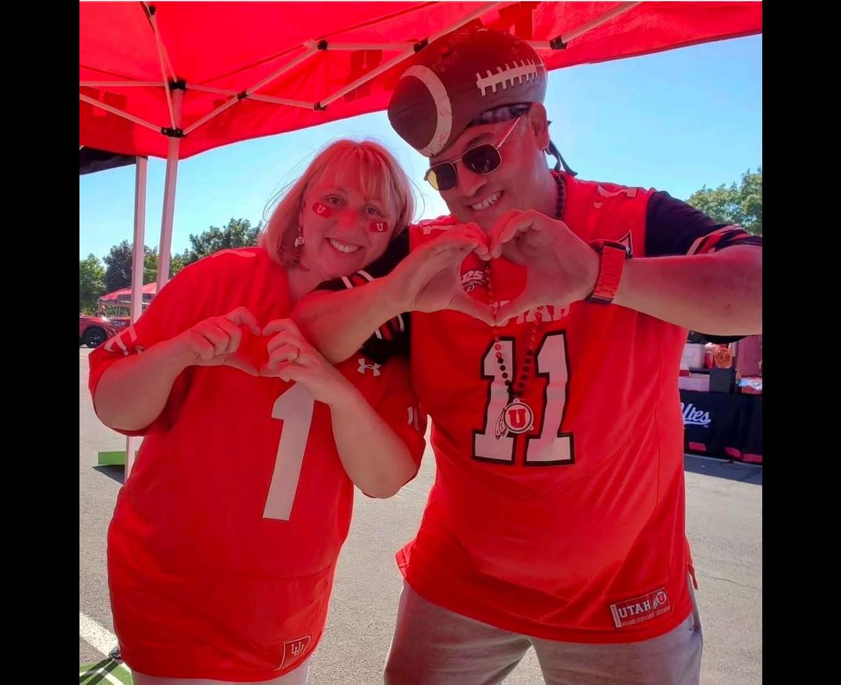 Marianna and Albert Gamboa enjoy tailgating prior to a University of Utah football game. The Gamboas are familiar faces in the Ute Nation.