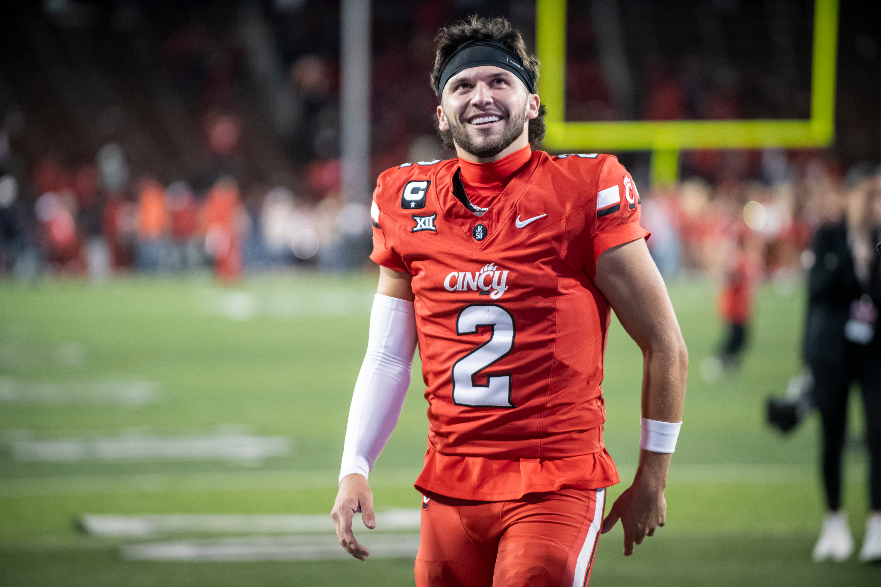 FILE - Cincinnati quarterback Brendan Sorsby (2) walks off the field after a NCAA college football game against Baylor, Oct. 25, 2025, in Cincinnati. 