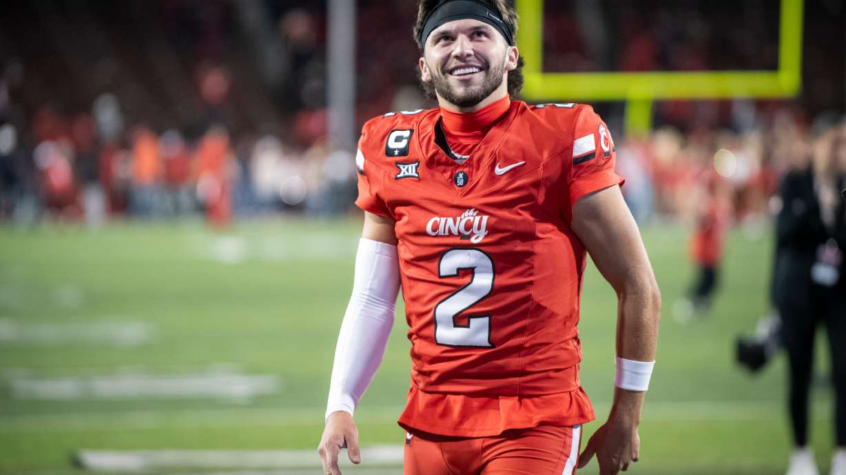 FILE - Cincinnati quarterback Brendan Sorsby (2) walks off the field after a NCAA college football game against Baylor, Oct. 25, 2025, in Cincinnati.