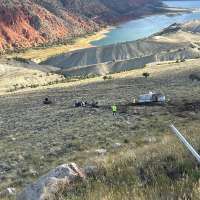 Semitruck driver hospitalized after rolling, falling down embankment in Daggett County