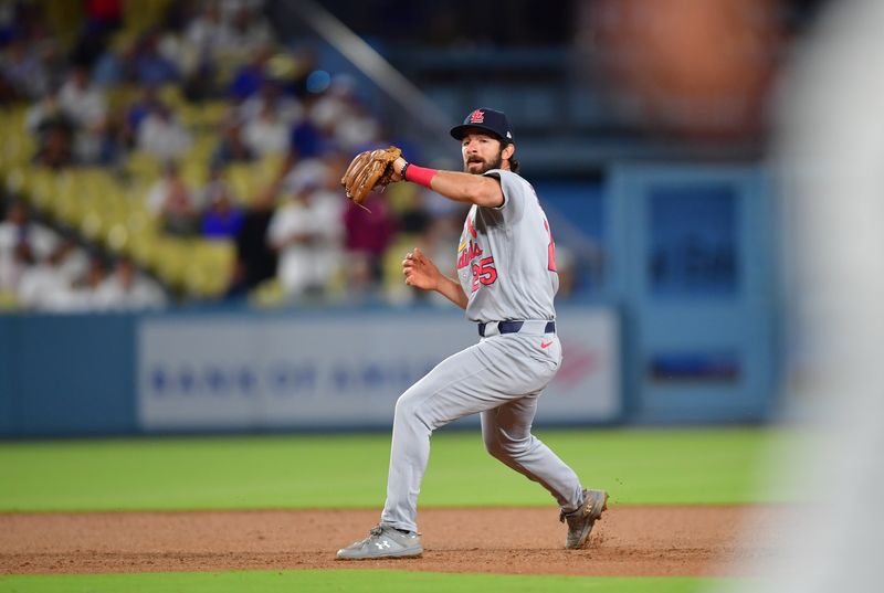 Cardinals rally in 10th inning, extend Dodgers' slump
