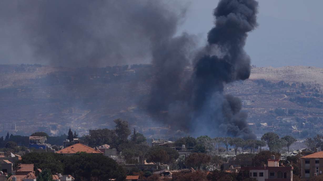Smoke rises as Israeli forces demolish homes in Zawtar al-Sharqiyah, southern Lebanon, Aug. 23. A Lebanese man held prisoner in Israel was released on Thursday.