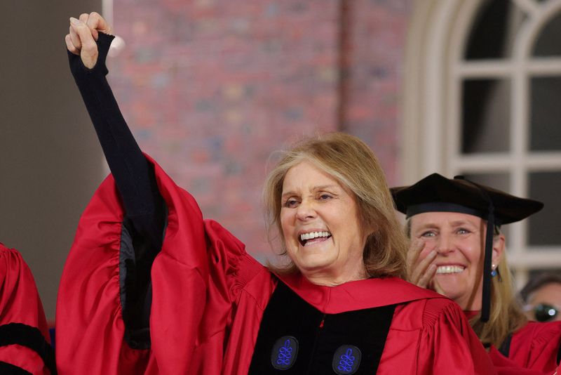 Gloria Steinem salutes the graduating students as she receives an honorary Doctor of Humane Letters during Harvard's commencement in Cambridge, Mass., May 26, 2022. Steinem called herself "an entrepreneur of social change."