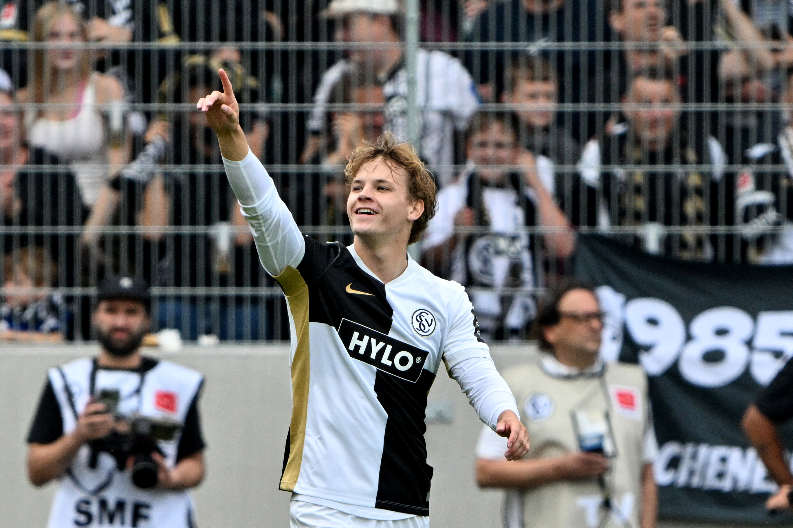 Elversberg's Cole Campbell celebrates after scoring during a Bundesliga soccer match between Elversberg and Bayer Leverkusen, in Spiesen-Elversberg, Germany, Saturday, Aug. 29, 2026. 
