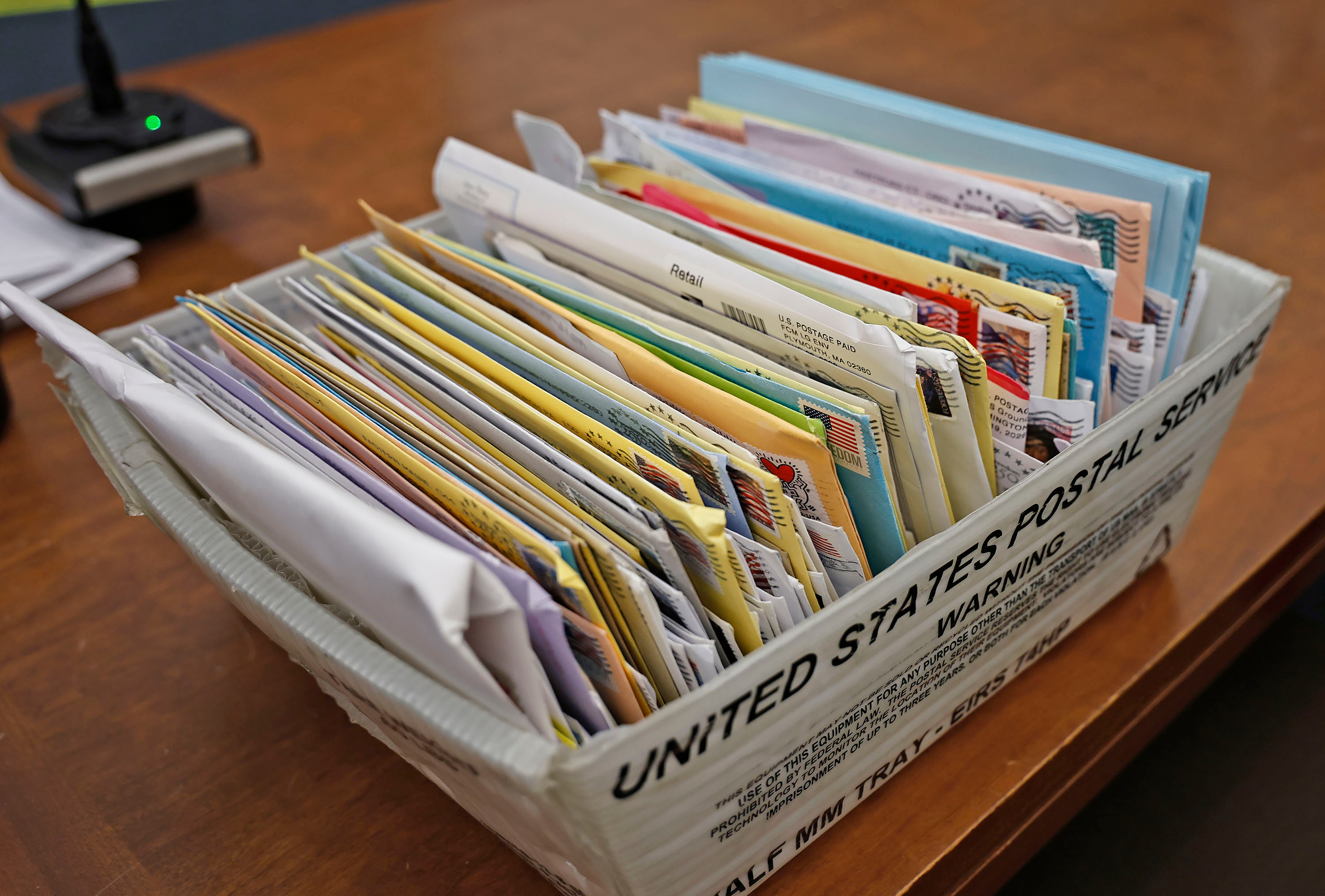 A carton of letters for Lindsay Clancy from supporters sits in court during Clancy's murder trial on Thursday, in Plymouth, Mass.