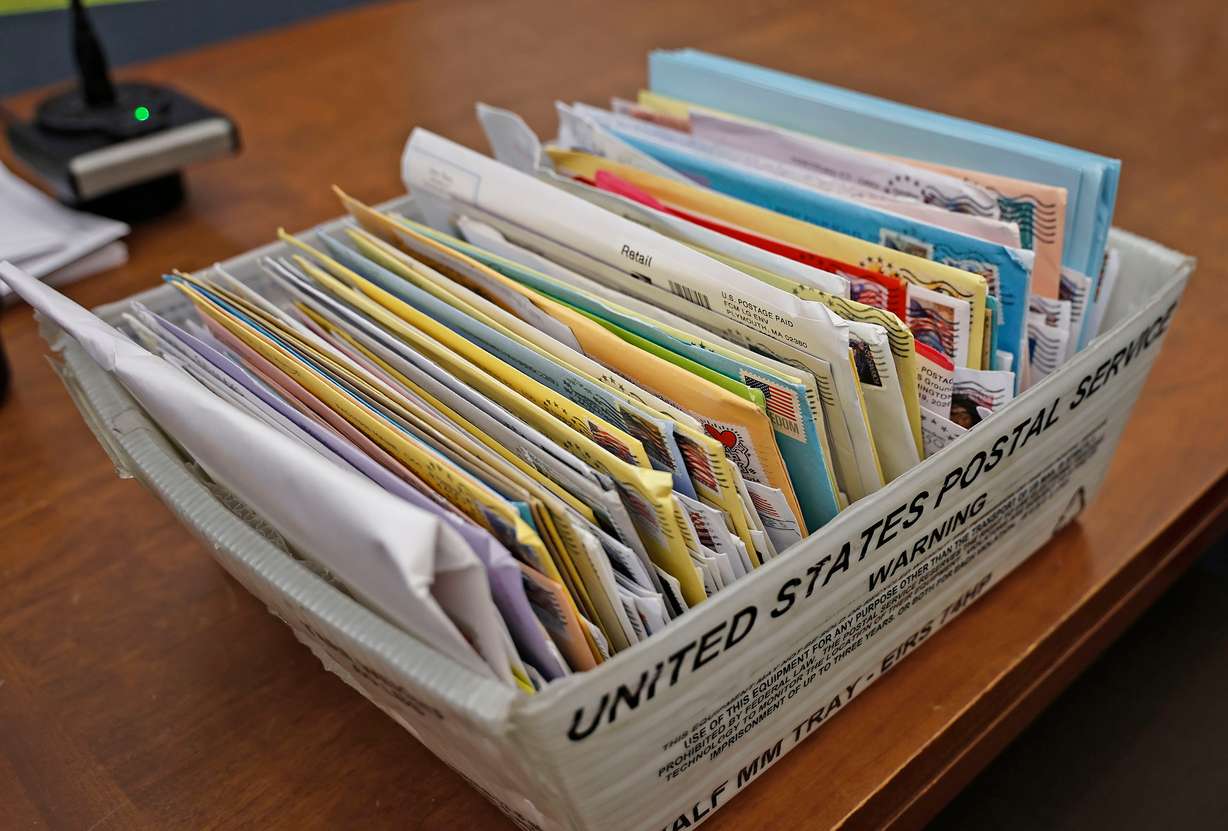 A carton of letters for Lindsay Clancy from supporters sits in court during Clancy's murder trial on Thursday, in Plymouth, Mass.