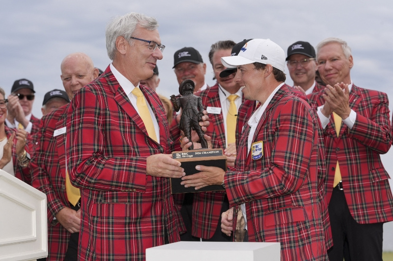 Apr 19, 2026; Hilton Head, South Carolina, USA; Matt Fitzpatrick celebrates his playoff win and receives his plaid jacket and his trophy after the overtime win of the RBC Heritage golf tournament.