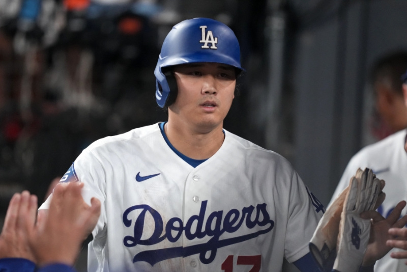 Sep 1, 2026; Los Angeles, California, USA;  Los Angeles Dodgers pitcher Shohei Ohtani (17) celebrates in the dugout after scoring a run during the seventh inning against the St. Louis Cardinals at Dodger Stadium.