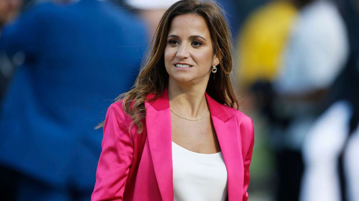 ESPN reporter Dianna Russini on the sidelines before the start of an NFL football game between the Oakland Raiders and the Denver Broncos in September 2019, in Oakland, California.
