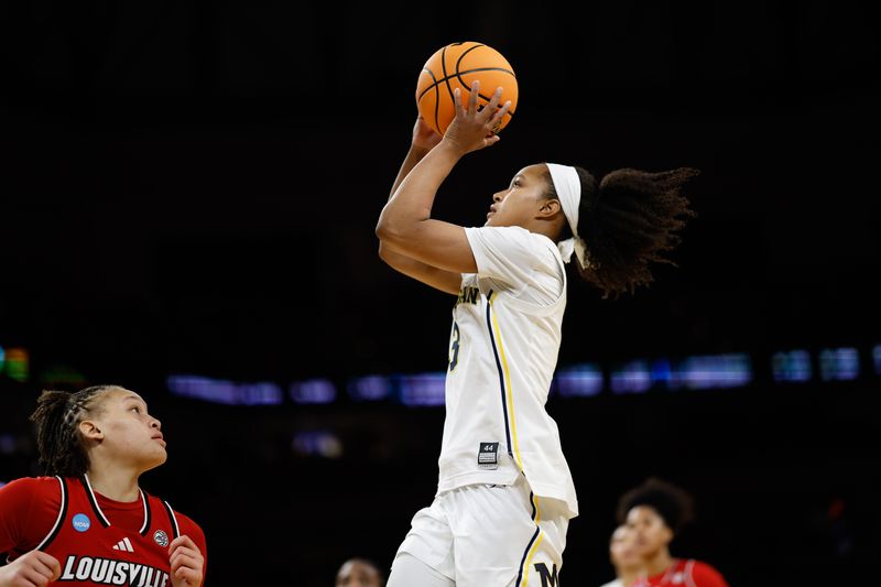 Mar 28, 2026; Fort Worth, TX, USA;  Michigan Wolverines guard Mila Holloway (3) attempts a basket against Louisville Cardinals guard Imari Berry (2) during the second half at Dickies Arena.