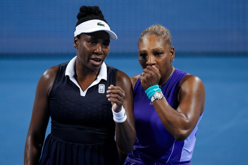 Aug 17, 2026; Mason, OH, USA;  Serena Williams and Venus Williams of the United States talk after a point against Marta Kostyuk of Ukraine and Peyton Stearns of the United States in their doubles match during the Cincinnati Open at Lindner Family Tennis Center.