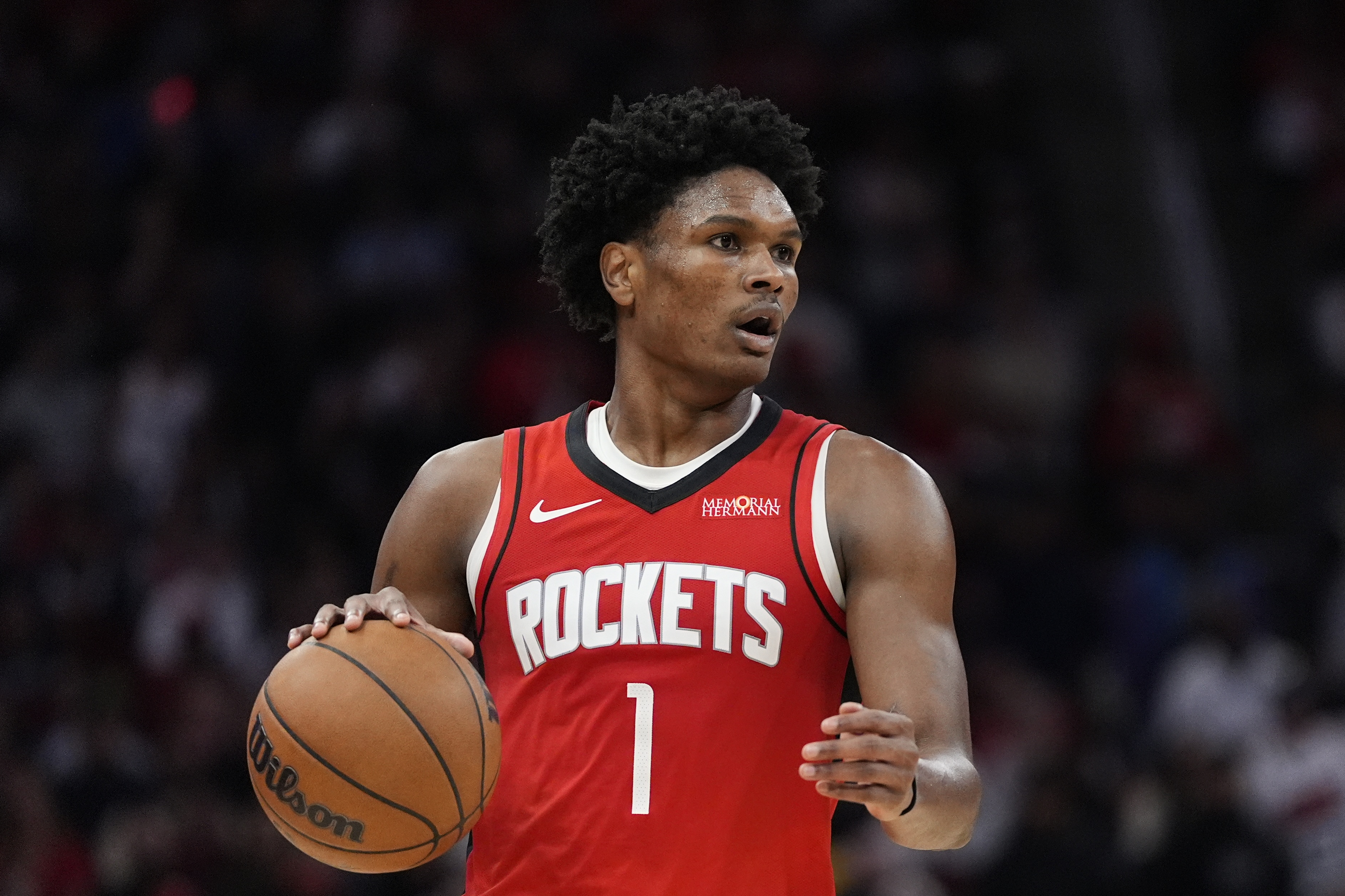 FILE - Houston Rockets guard Amen Thompson controls the ball during the second half of an NBA basketball game against the San Antonio Spurs in Houston, Jan. 20, 2026. 