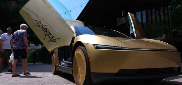 Musk launches steering-wheel-free taxi service in bet riders lose 'no control' fears and hop inside