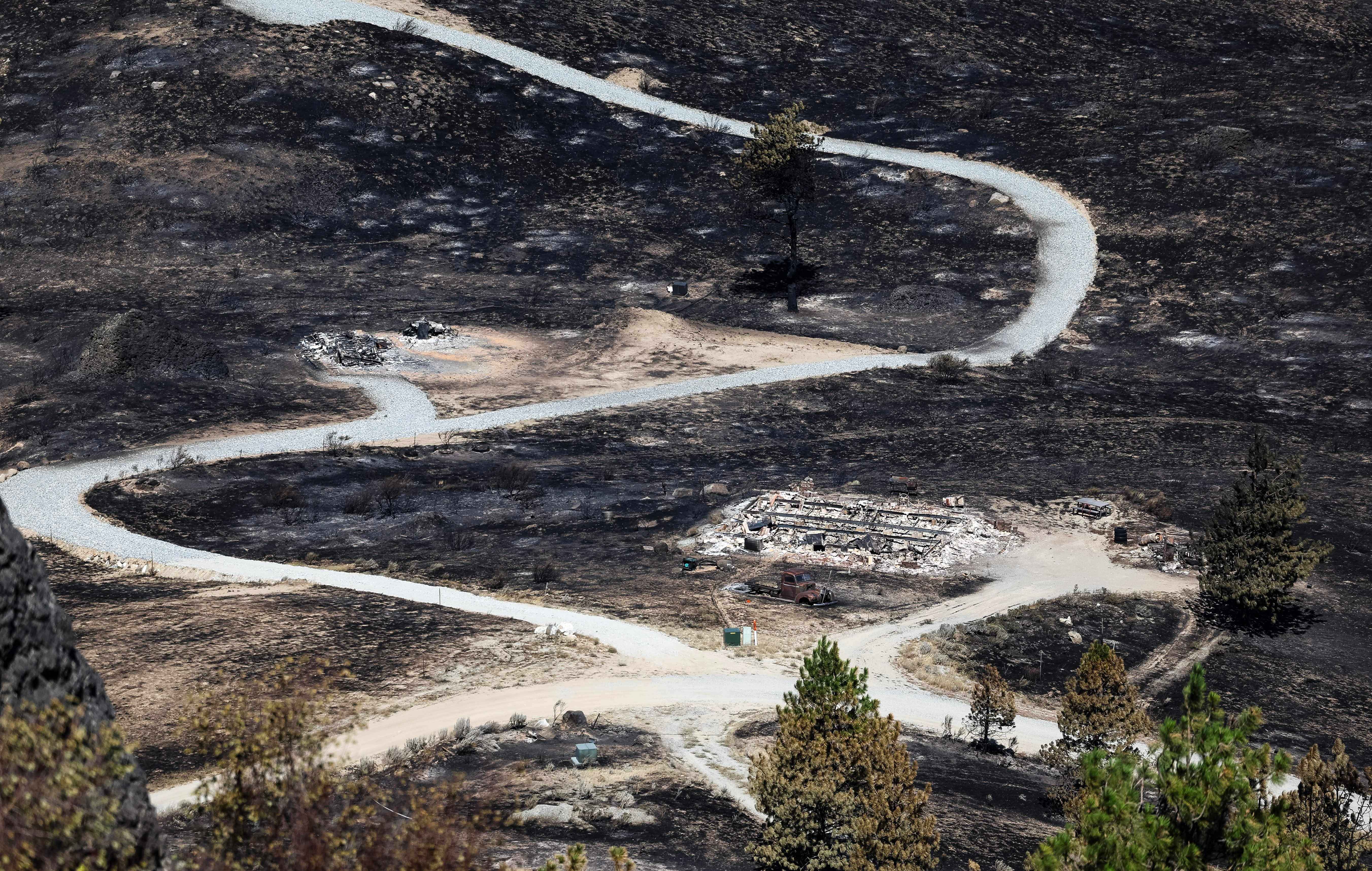 Teenager arrested and 5 others sought in deadly July 4 fire in Washington state