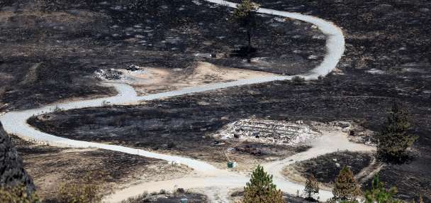 Teenager arrested and 5 others sought in deadly July 4 fire in Washington state