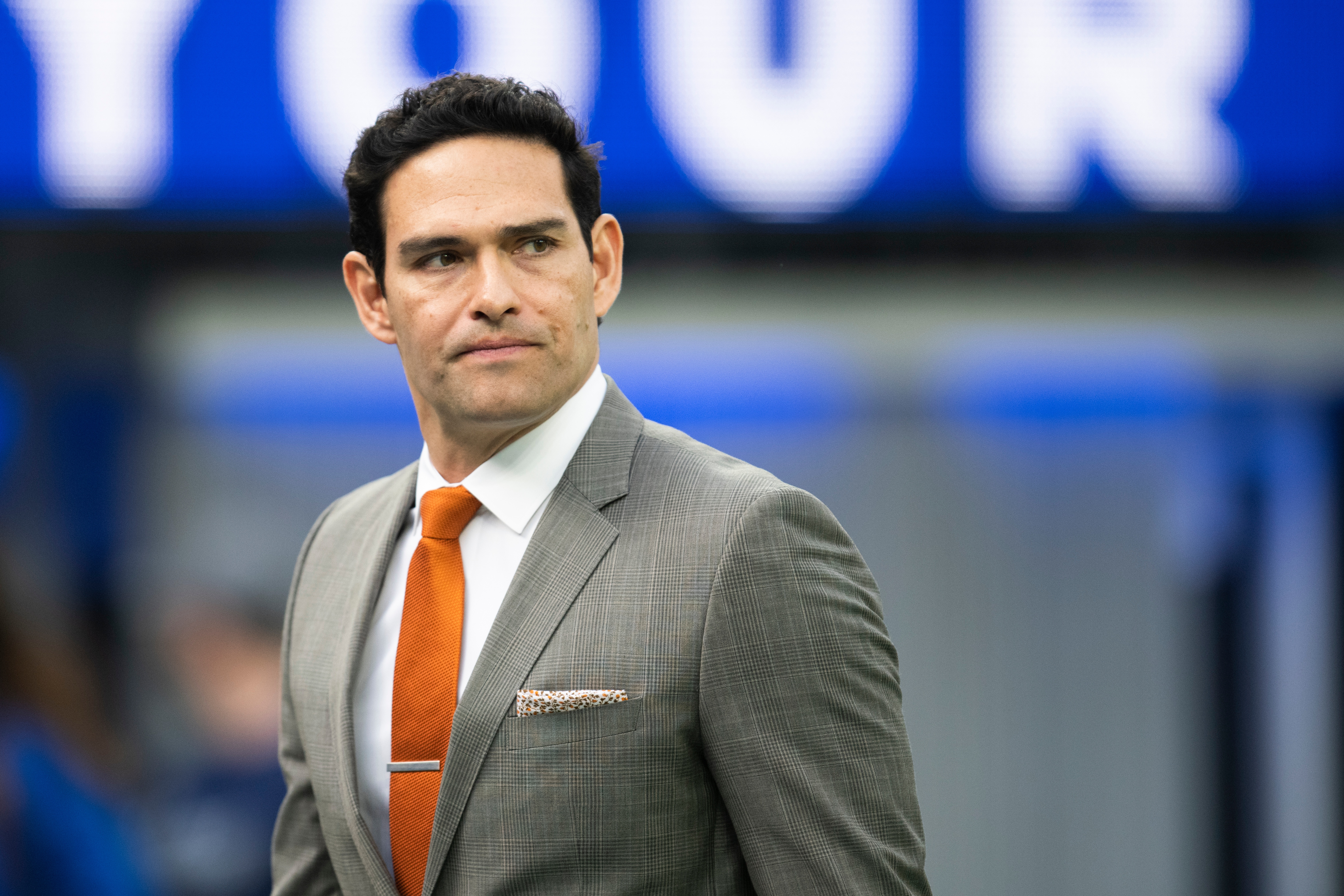 FILE - Mark Sanchez walks on the field before an NFL football game between the Los Angeles Rams and the Jacksonville Jaguars Sunday, Dec. 5, 2021, in Inglewood, Calif. 