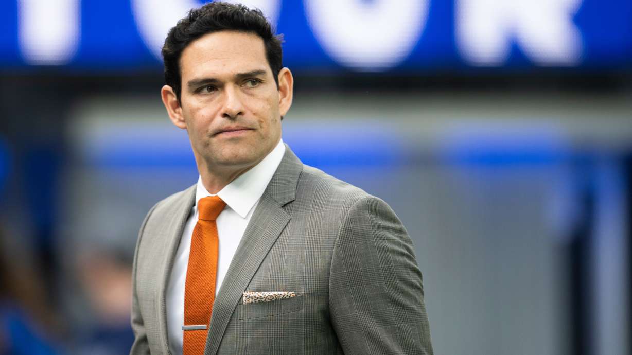 FILE - Mark Sanchez walks on the field before an NFL football game between the Los Angeles Rams and the Jacksonville Jaguars Sunday, Dec. 5, 2021, in Inglewood, Calif.