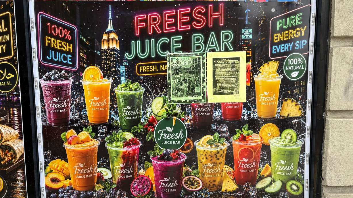 An AI ad for "Freesh Juice Bar" outside of a Brooklyn bodega featured some impossible looking creations.