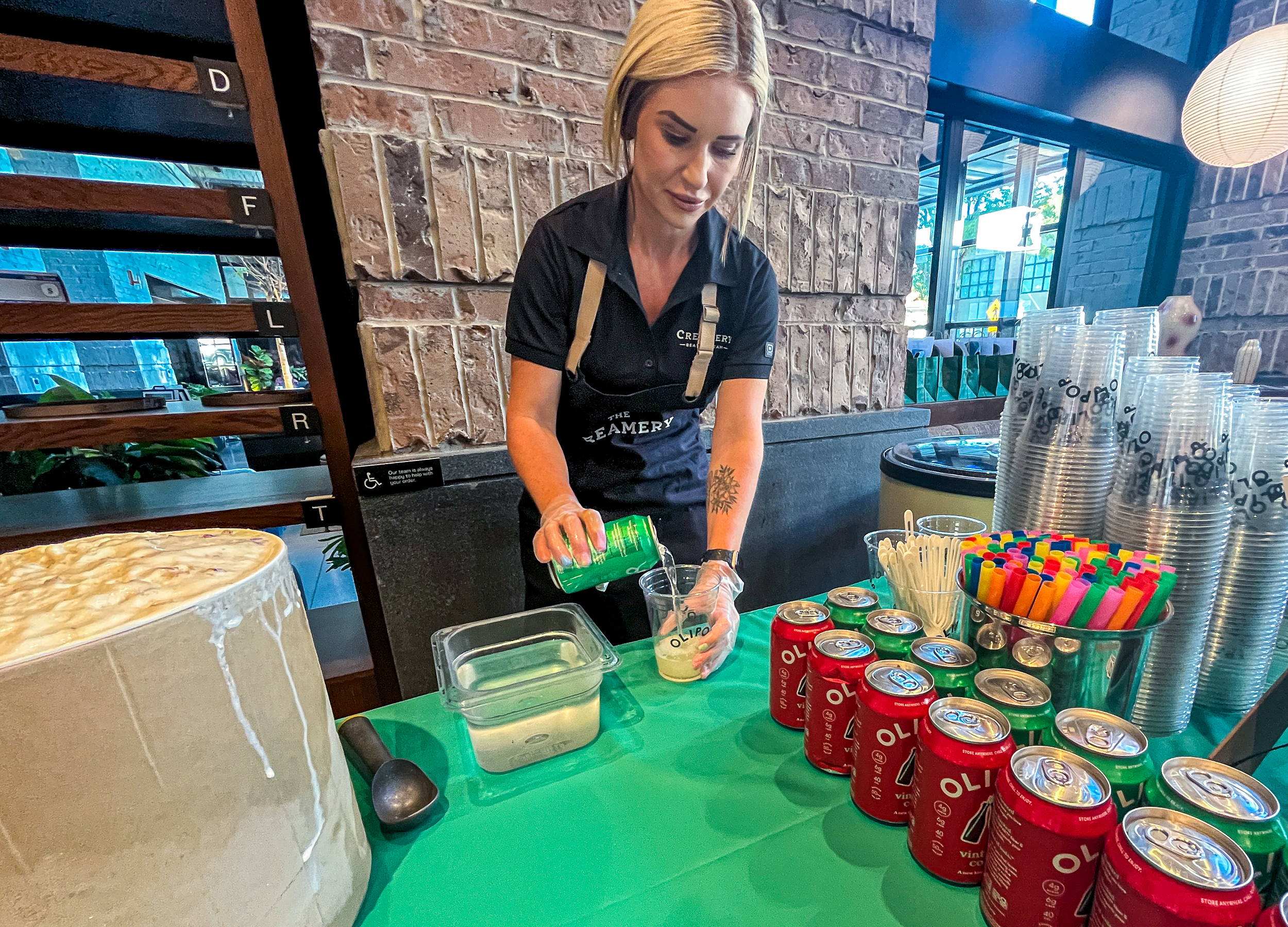 An OLIPOP "soda float" is prepared during a Sweetgreen preview event at the chain's Salt Lake City location on Thursday. Sweetgreen owners say they are partnering with The Creamery to offer the dirty soda-adjacent beverage as a nod to Utah's sweet treat during Sweetgreen's grand opening on Tuesday.