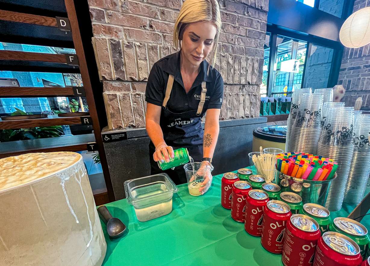 An OLIPOP "soda float" is prepared during a Sweetgreen preview event at the chain's Salt Lake City location on Thursday. Sweetgreen owners say they are partnering with The Creamery to offer the dirty soda-adjacent beverage as a nod to Utah's sweet treat during Sweetgreen's grand opening on Tuesday.