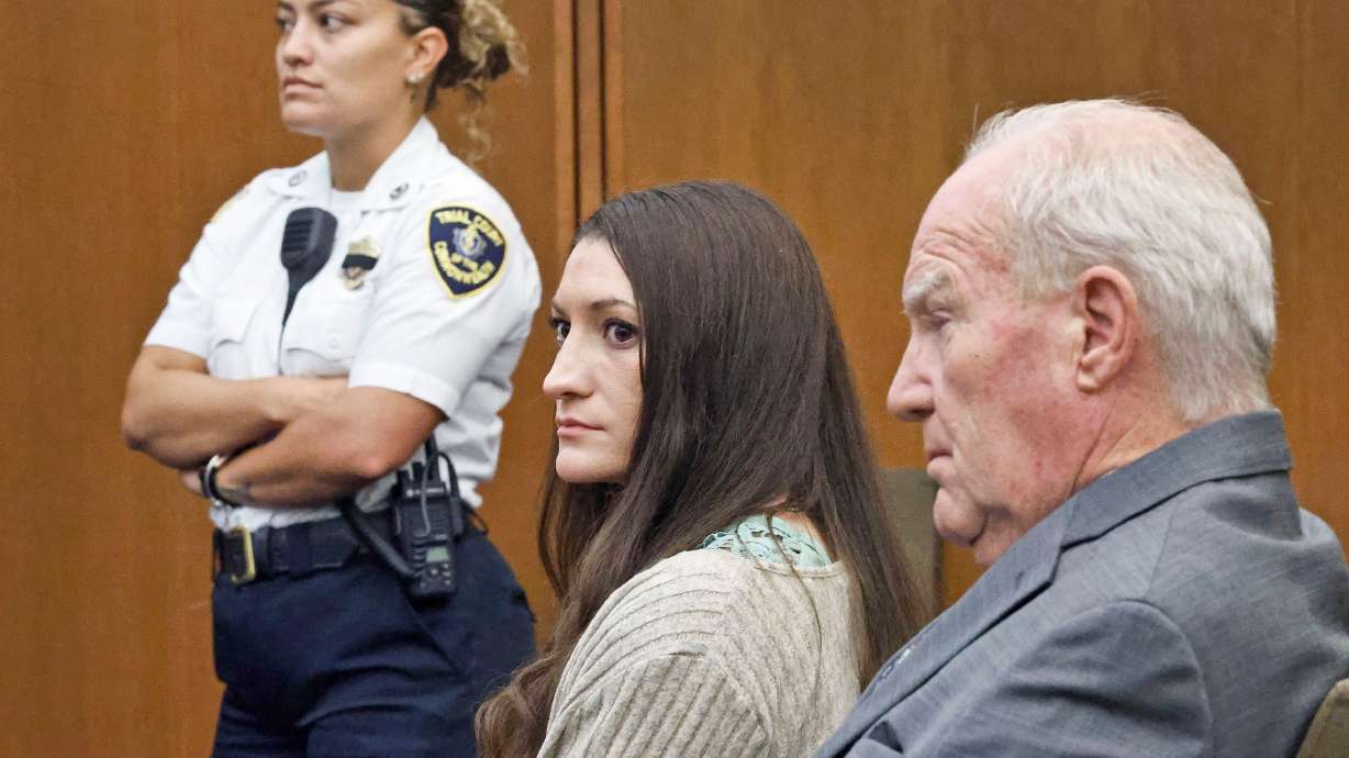 Lindsay Clancy looks at jurors as Judge William Sullivan asks them to start deliberations for a sixth day during her murder trial on Thursday, in Plymouth, Mass. Sullivan declared a mistrial on Friday after the jury could not reach a verdict.