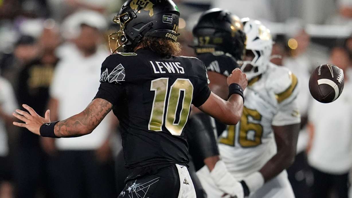 Colorado quarterback Julian Lewis (10) loses the ball whilst passing against Georgia Tech during the first half of an NCAA college football game, Thursday, Sept. 3, 2026, in Atlanta.