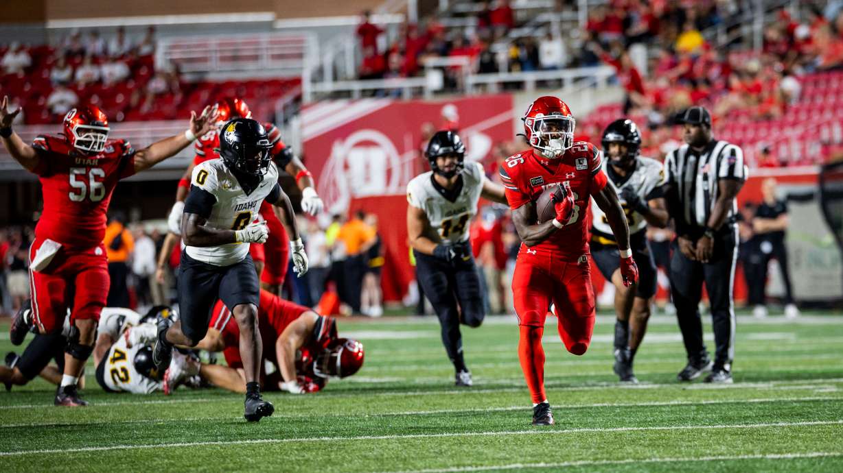 Utah Utes running back LaMarcus Bell (26) runs to score a touchdown during an NCAA football game against the Idaho Vandals at Rice-Eccles Stadium in Salt Lake City on Thursday, Sept. 3, 2026.
