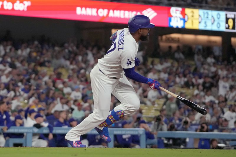 Sep 3, 2026; Los Angeles, California, USA; Los Angeles Dodgers left fielder Teoscar Hernandez (37) hits a walk-off double against the St. Louis Cardinals at Dodger Stadium.