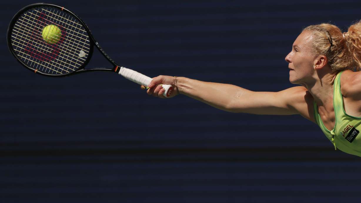 Katerina Siniakova, of the Czech Republic, returns the ball to Naomi Osaka, of Japan, during the second round of the U.S. Open tennis championships against Thursday, Sept. 3, 2026, in New York.