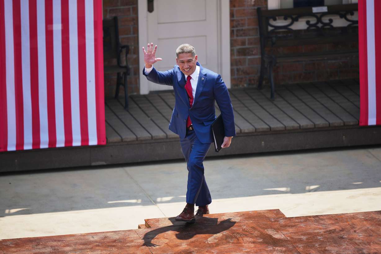 Acting Secretary of the Navy is Hung Cao walks on stage at the Burning Hills Amphitheater during the Theodore Roosevelt Presidential Library opening ceremony July 1, in Medora, N.D.