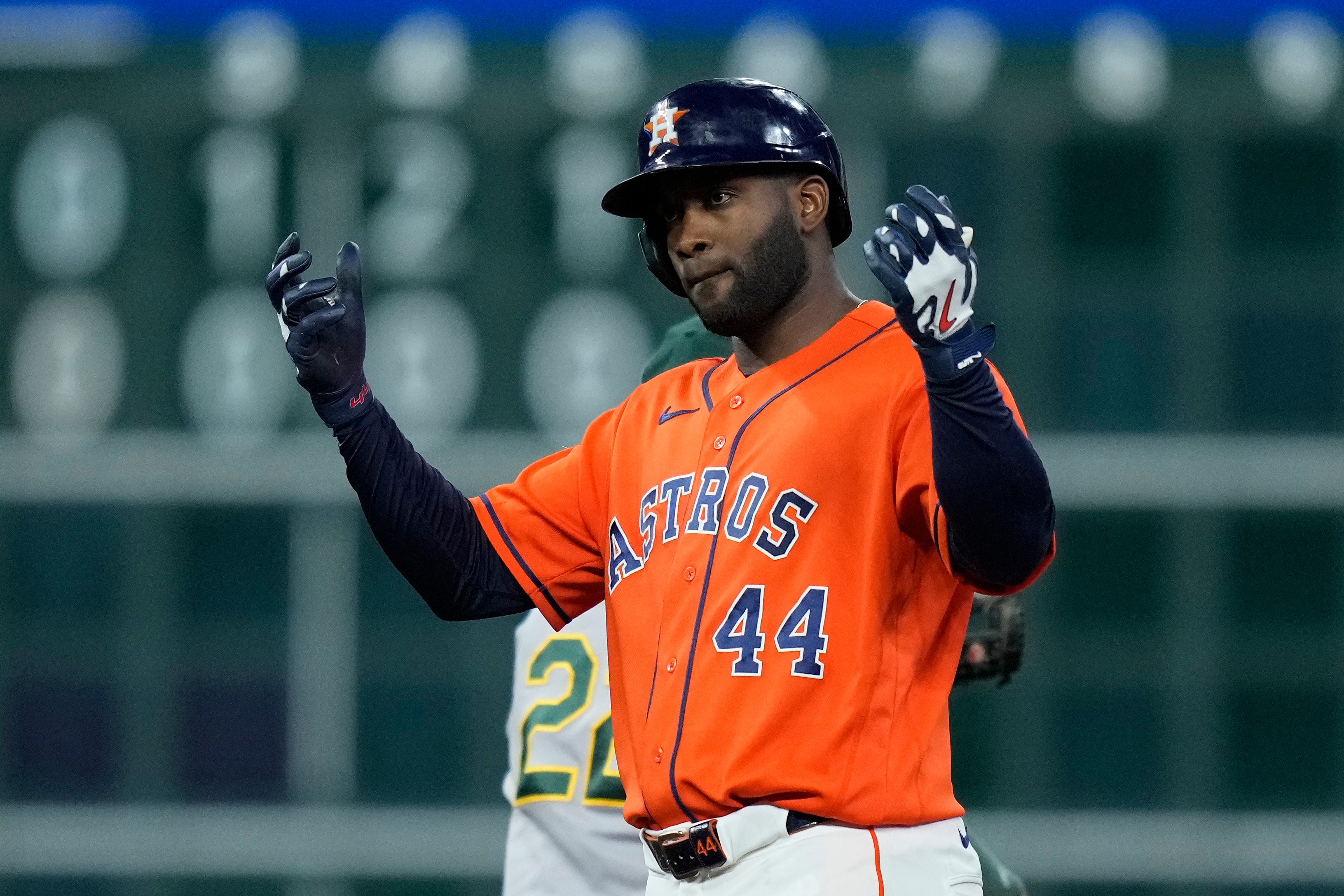 Houston Astros' Yordan Alvarez celebrates after hitting an RBI double during the seventh inning of a baseball game against the Athletics, Friday, Aug. 21, 2026, in Houston. 