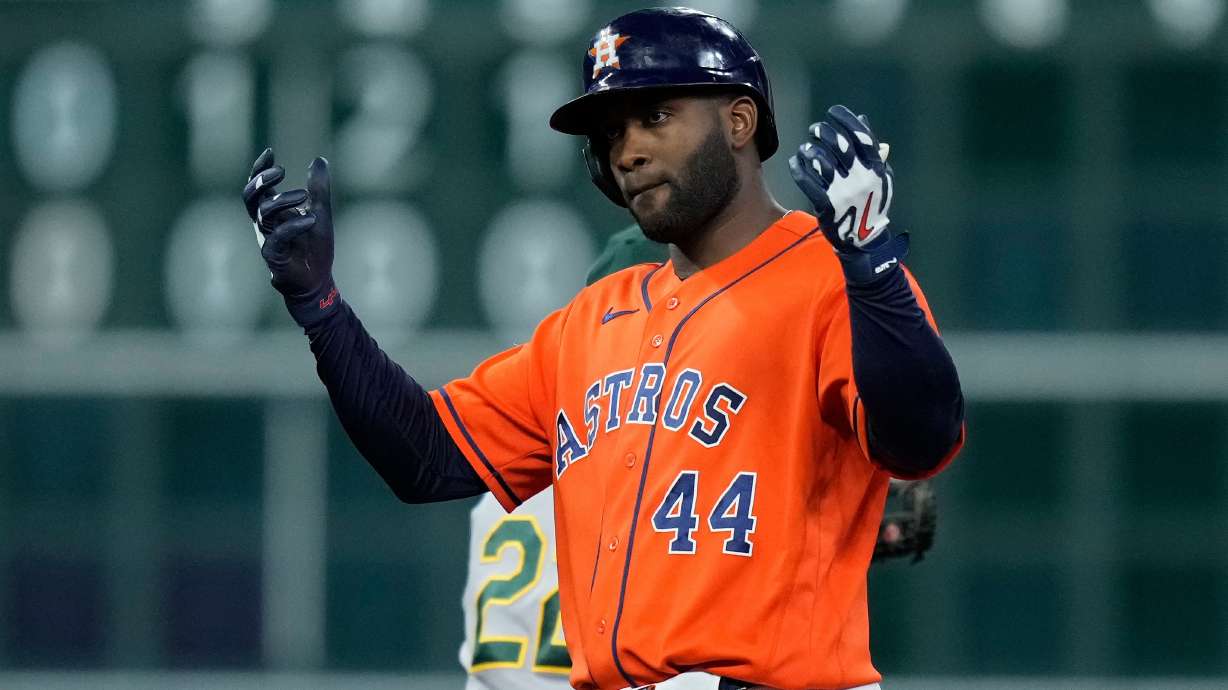 Houston Astros' Yordan Alvarez celebrates after hitting an RBI double during the seventh inning of a baseball game against the Athletics, Friday, Aug. 21, 2026, in Houston.