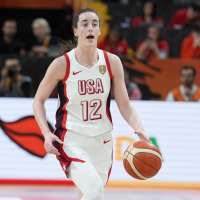 Caitlin Clark helps US beat China and 7-foot-3 Zhang Ziyu 94-61 in women's World Cup opener