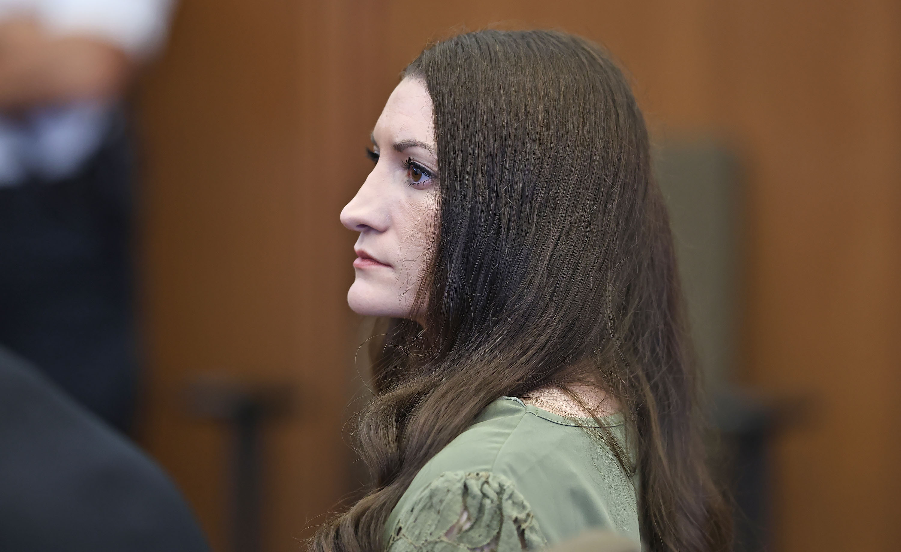 Defendant Lindsay Clancy watches jurors enter the courtroom during her murder trial on Friday, in Plymouth, Mass. Judge William Sullivan allowed Clancy's defense to file an emergency appeal to avoid a mistrial.