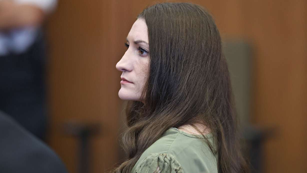 Defendant Lindsay Clancy watches jurors enter the courtroom during her murder trial on Friday, in Plymouth, Mass. Judge William Sullivan allowed Clancy's defense to file an emergency appeal to avoid a mistrial.