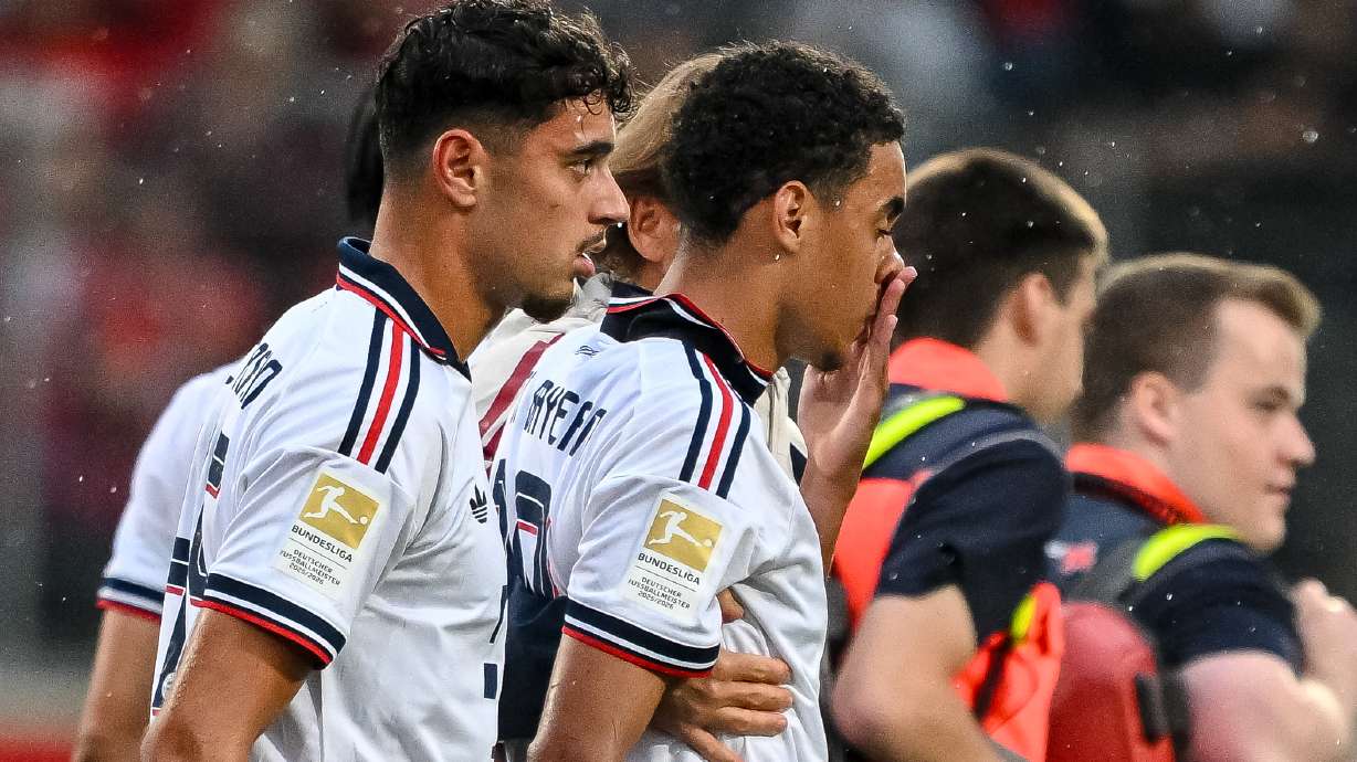 Bayern's Jamal Musiala, second left, leaves the field during a friendly soccer match between FC Heidenheim and FC Bayern Munich in Heidenheim, Germany, Tuesday, Aug. 18, 2026.