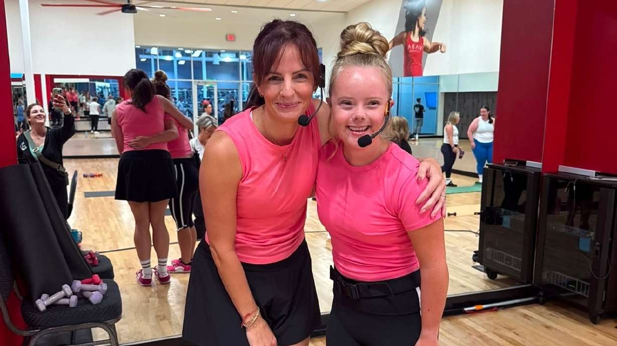 Aubry Alldredge, 22, of Kaysville, became the first individual with Down syndrome to become an UpBeat Barre instructor. She said she loves being on stage, giving options and making everyone feel included.